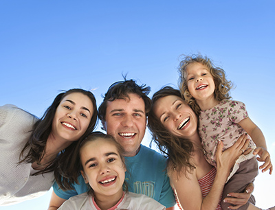 Ann Arbor, MI family smiling about their dentist visit.